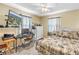 Inviting bedroom with a bed, desk, and a TV for relaxing and working at 1449 45Th Ne Ave, St Petersburg, FL 33703