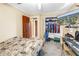 Comfortable bedroom with neutral walls, carpet flooring, a closet, and a TV at 1449 45Th Ne Ave, St Petersburg, FL 33703
