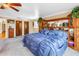 Bright bedroom with a ceiling fan, neutral walls, plush carpeting, and built-in storage at 1449 45Th Ne Ave, St Petersburg, FL 33703