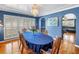 Inviting dining room with hardwood floors and view into connected living space at 1449 45Th Ne Ave, St Petersburg, FL 33703