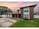 Charming two-story home boasts a well-manicured lawn, a three-car garage, and an inviting arched entryway at 1449 45Th Ne Ave, St Petersburg, FL 33703
