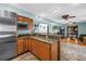 Spacious kitchen with stainless appliances, granite countertops, and adjacent Gathering room at 1449 45Th Ne Ave, St Petersburg, FL 33703