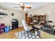 Functional office space with hardwood floors, ceiling fan, and dedicated workspace at 1449 45Th Ne Ave, St Petersburg, FL 33703