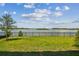 Backyard overlooking a scenic lake at 1599 Running Tide Pl, Sarasota, FL 34240
