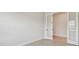 Modern home office featuring luxury vinyl plank flooring and privacy glass doors, ideal for a professional workspace at 1599 Running Tide Pl, Sarasota, FL 34240