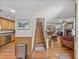 Open-concept foyer and staircase leading to a living room and kitchen area at 16326 Kalli Way, Dade City, FL 33523