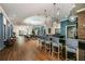 Spacious bar and seating area features modern lighting and stylish furnishings for community gatherings at 17244 Tortoise Crown Blvd, Land O Lakes, FL 34638