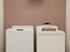 Laundry room with a washing machine and dryer; perfect for easy laundering at 17244 Tortoise Crown Blvd, Land O Lakes, FL 34638