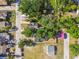 Aerial view of a neighborhood with tree-lined streets and well-maintained homes at 1750 Dayton S St, St Petersburg, FL 33712