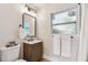 Modern bathroom with a stylish vanity, sleek mirror, and contemporary fixtures at 1750 Dayton S St, St Petersburg, FL 33712