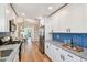 Spacious kitchen with an open layout and seamless flow to the dining area at 1750 Dayton S St, St Petersburg, FL 33712