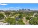 Gorgeous aerial view featuring the city skyline and lush trees, offering a serene yet urban living experience at 2200 N Glenwood Dr, Tampa, FL 33602