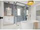 Modern bathroom featuring soaking tub, glass shower and double vanity at 2200 N Glenwood Dr, Tampa, FL 33602
