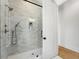 Stylish shower with modern tile and glass door, complete with a rain shower head and ample space at 2200 N Glenwood Dr, Tampa, FL 33602
