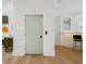 Interior shot of elevator door and call button within a home with hardwood floors at 2200 N Glenwood Dr, Tampa, FL 33602
