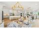 Bright open concept featuring a kitchen, seating around a kitchen island, and modern decor at 2200 N Glenwood Dr, Tampa, FL 33602