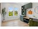 Well-organized mudroom features custom built-ins, storage, and a view to the outside at 2200 N Glenwood Dr, Tampa, FL 33602