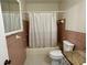 Bathroom with vanity, toilet, mirror, and shower/tub at 2263 Americus E Blvd # 25, Clearwater, FL 33763