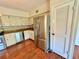 Well-equipped kitchen with stainless steel refrigerator and modern appliances at 2263 Americus E Blvd # 25, Clearwater, FL 33763