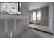 Future bathroom featuring framing, rough plumbing, and a design concept at 2301 N Ridgewood Ave, Tampa, FL 33602