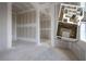 Large bedroom with unfinished drywall and a rendering showing the spacious bedroom and bathroom layout at 2301 N Ridgewood Ave, Tampa, FL 33602