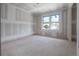 Room with two windows featuring drywall and awaiting personalization at 2301 N Ridgewood Ave, Tampa, FL 33602