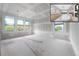 A spacious bedroom being remodeled that features bright natural light at 2301 N Ridgewood Ave, Tampa, FL 33602