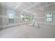 Spacious bonus room with multiple windows offering abundant natural light and scenic views at 2301 N Ridgewood Ave, Tampa, FL 33602