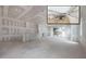 Open-concept living space under construction, ideal for entertaining and modern living at 2301 N Ridgewood Ave, Tampa, FL 33602