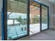 Expansive patio doors lead to a covered terrace overlooking the neighborhood at 2301 N Ridgewood Ave, Tampa, FL 33602