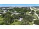 Aerial view of the property and surrounding area, featuring trees and cityscape at 2305 N 48Th St, Tampa, FL 33605