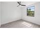 Bright bedroom featuring a ceiling fan and a window at 2305 N 48Th St, Tampa, FL 33605