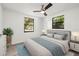 Cozy primary bedroom with two windows at 2305 N 48Th St, Tampa, FL 33605