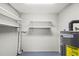 Utility room with water heater and shelving at 2305 N 48Th St, Tampa, FL 33605