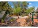 Private backyard with brick patio, mature trees, and tranquil garden at 2450 2Nd N Ave, St Petersburg, FL 33713