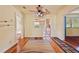 Open dining room with hardwood floors and a ceiling fan at 2450 2Nd N Ave, St Petersburg, FL 33713