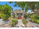 Charming home with a welcoming front porch and lush landscaping at 2450 2Nd N Ave, St Petersburg, FL 33713