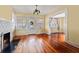 Bright living room with hardwood floors and a cozy fireplace at 2450 2Nd N Ave, St Petersburg, FL 33713