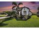 Beautiful single-story home boasts lush lawn, stone accents, and a well-manicured landscape at 2515 63Rd Ter E, Ellenton, FL 34222