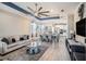 Open-concept living area with dining room, kitchen, and modern decor at 2515 63Rd Ter E, Ellenton, FL 34222