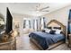 Main bedroom boasts a large bed with bay window seating area, and ensuite bathroom at 2515 63Rd Ter E, Ellenton, FL 34222