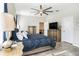 Spacious main bedroom featuring a large bed, and wood-style tile flooring at 2515 63Rd Ter E, Ellenton, FL 34222