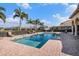 Relaxing community pool featuring lounge chairs, lush landscaping, and inviting clear water at 2515 63Rd Ter E, Ellenton, FL 34222