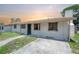 Modest home with a covered entrance and a simple, functional design at 2614 E Liberty St, Tampa, FL 33612