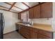 Kitchen showcasing wood cabinets and a stainless steel sink at 2614 E Liberty St, Tampa, FL 33612