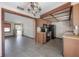 Kitchen showing wood cabinets and black appliances at 2614 E Liberty St, Tampa, FL 33612