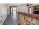 Inviting living area featuring tile floors, stone accents, and natural light at 2614 E Liberty St, Tampa, FL 33612