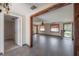 Bright living room showcasing tiled floors, wood accents, and lots of natural light at 2614 E Liberty St, Tampa, FL 33612