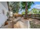 Cozy backyard featuring a charming fire pit area and privacy fence for outdoor relaxation and enjoyment at 2838 Timber Knoll Dr, Valrico, FL 33596