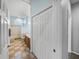Well-lit bathroom featuring a bathtub-shower, tile floors, and a wooden cabinet at 30017 Johnston Rd, Dade City, FL 33523